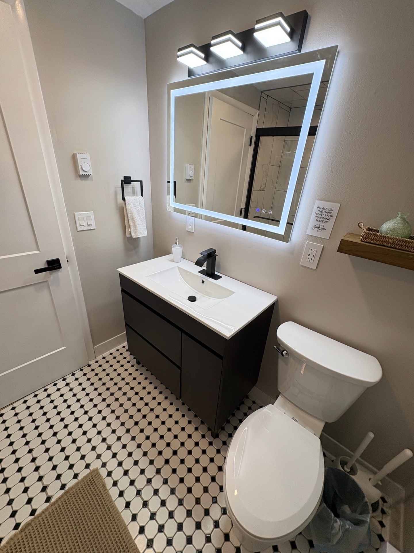 Bathroom vanity and toilet